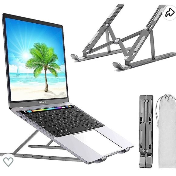 Adjustable stand.  New in box - Picture 1 of 6